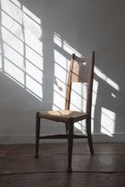 An Arts and Crafts oak side chair in the manner of William Birch