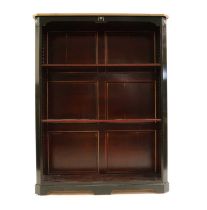 An Empire-style ebonised bookcase by Roche Bobois