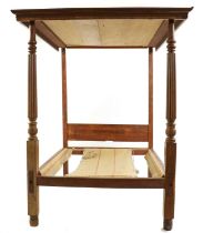 A mahogany four poster bed,