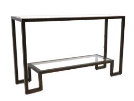 A tubular metal and glass console table