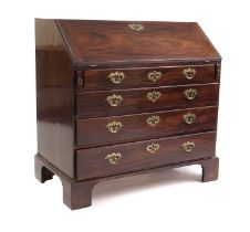 An early George III mahogany bureau,