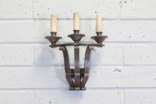 A French three-light fer forgé wall light,
