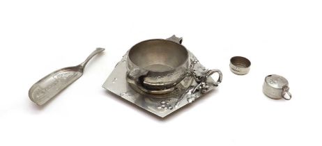 A collection of pewter items