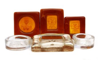 A group of Boda glass dishes or ashtrays,