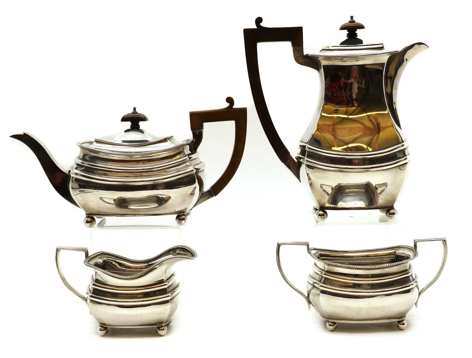 A silver four piece tea service