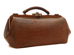 A small vintage leather 'Gladstone' bag
