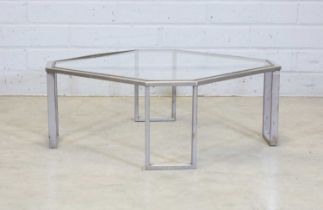 A chrome and glass coffee table,