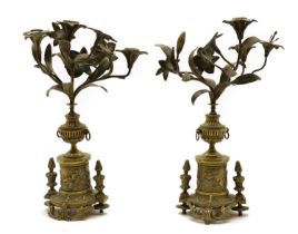 A pair of brass candelabra,