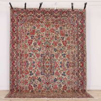 A Persian wool carpet,