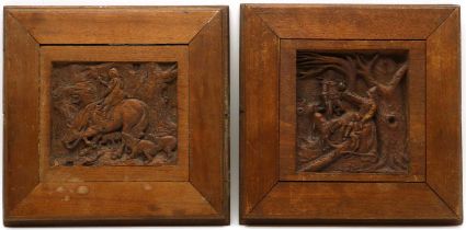 A pair of carved panels,