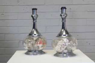 A pair of French chrome and glass-mounted table lamps,