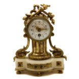 A Louis XVI-style gilt-metal and onyx boudoir clock