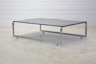 A chromed steel coffee table,