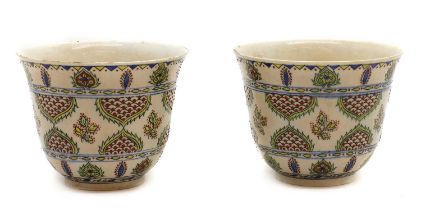 A pair of Samson pottery vases,