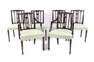 A set of six mahogany rail back dining chairs
