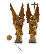 A pair of carved polychrome angels