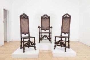 A set of six walnut dining chairs,