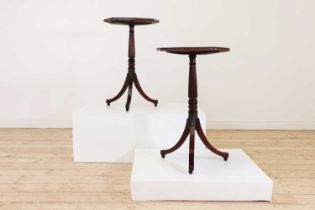 A pair of Regency-style mahogany, ebonised and simulated mahogany lamp tables,