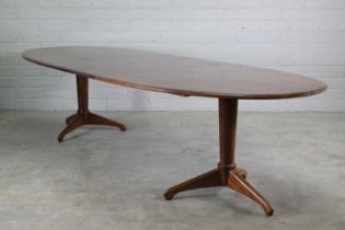 A rosewood dining table,