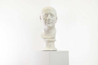 A plaster bust after the antique,