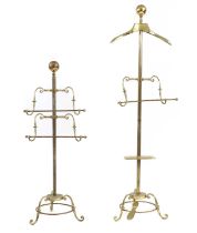 Two brass valets,