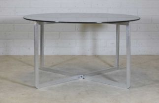 A glass and steel table,