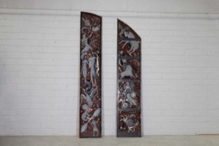 A pair of French reverse-painted 'zodiac' glass panels,