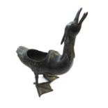 A Chinese bronze censer in the form of a standing goose with web feet, (back lid missing, A/F). H 19