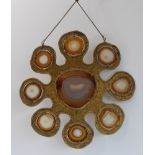 A 1970s gilt-metal hanging mobile, set with a large central agate panel surrounded by eight