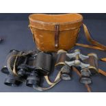 Two pairs of field glasses: 1. a pair of WWI German Army issue Carl Zeiss DF03 field glasses, the