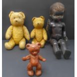 Two teddy bears and a Pedigree doll