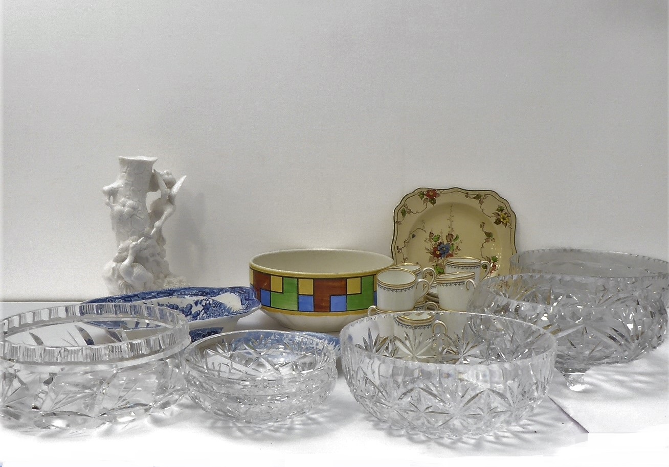 A box of glassware and china to include, glass fruit bowls, Aynsley coffee cans and saucers and an