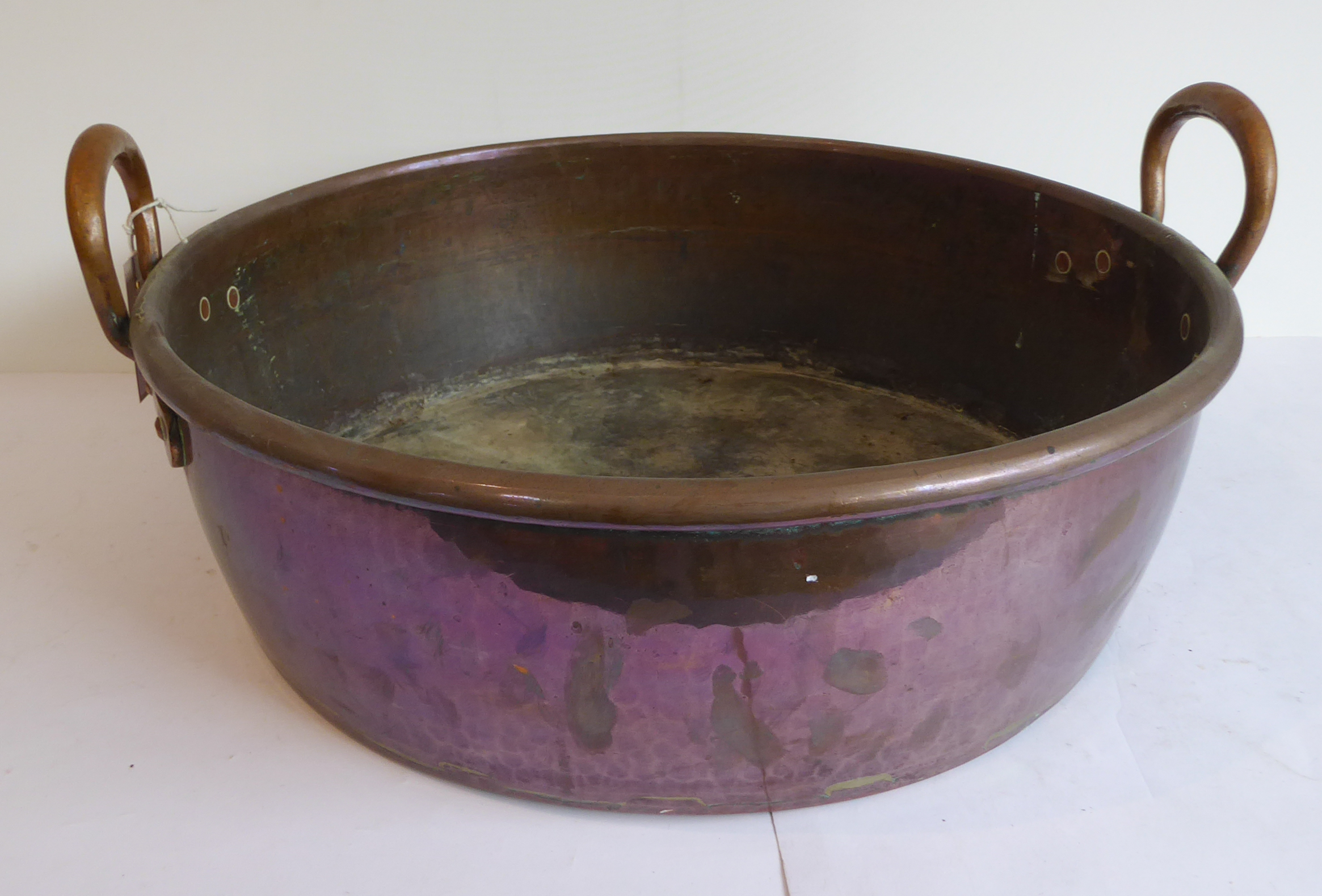 A large 19th century copper jam-pan with riveted loop-handles (15  x 48 cm) and an Arts and Crafts - Image 4 of 4