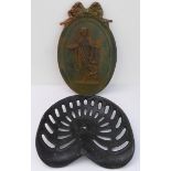A cast-iron wall plaque with Abundantia-style relief (50 x 31.5 cm) and an early 20th century cast-