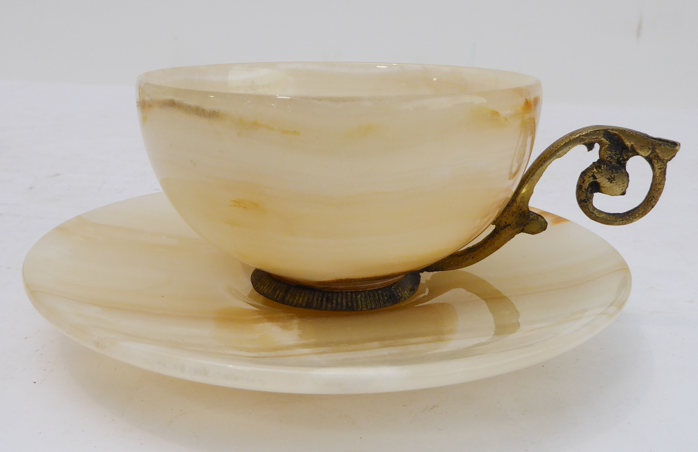 A set of six mid-20th century gilt-metal-mounted onyx cups and saucers, three other pieces of onyx - Image 3 of 6