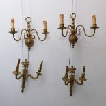 Two pairs of 20th century brass wall lights after the antiques: a pair in Adam style with tapered