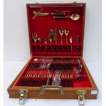 A Thai nickel-bronze ('high tarnish resistant') 12-place cutlery canteen comprising: varying sized
