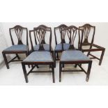 A set of six Hepplewhite-style mahogany armchairs: yoke-shaped top rails, Gothic-style pierced