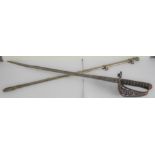 A Pattern 1897 cavalry officer's sword and scabbard: the 35" 'Patent Solid Hilt' blade numbered