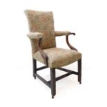 An 18th century upholstered and mahogany open armchair of small proportions: outset scrolling arms
