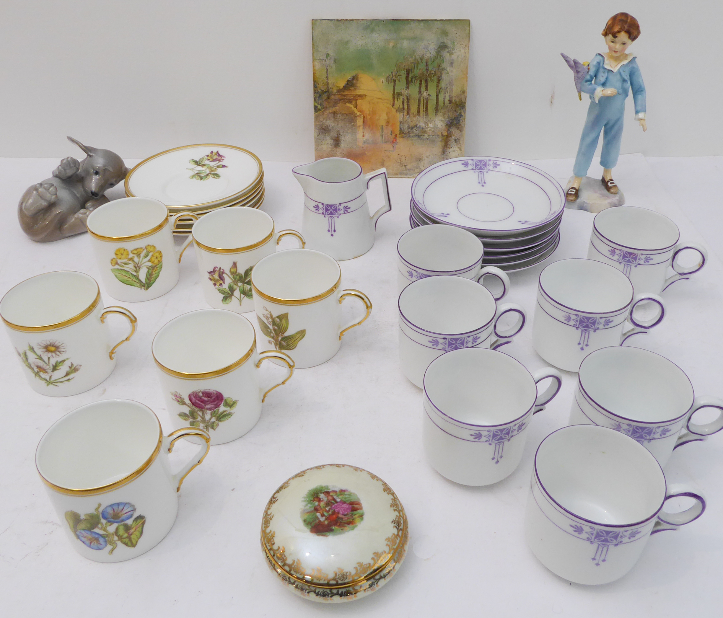 A selection to include: two sets of six coffee cans and saucers - a Royal Worcester set (one A/F)