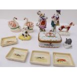 An interesting selection of twelve ceramic pieces to include: a pair of 19th century Staffordshire