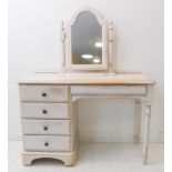 A shabby-chic-style bedroom set comprising dressing table, mirror and two bedside-style cabinets (
