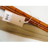 A vintage Army & Navy four-piece coarse fishing rod with brass ferule engraved: 'A & N.C.P.L.,