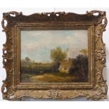 An early 19th century carved giltwood framed oil on canvas countryside study with a lone figure