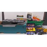Two boxes of Scalextric equipment to include three cars formula one cars, track, speed controllers