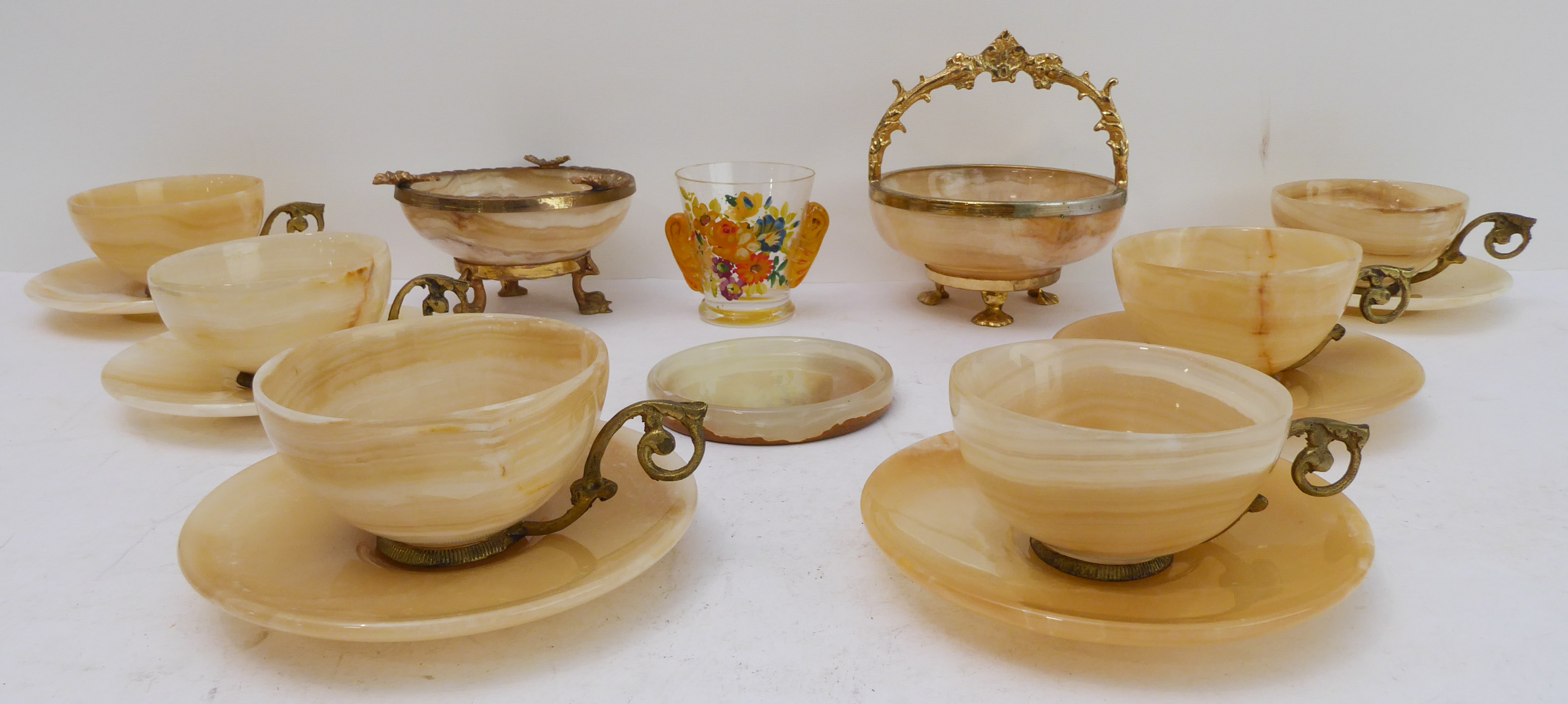 A set of six mid-20th century gilt-metal-mounted onyx cups and saucers, three other pieces of onyx - Image 2 of 6