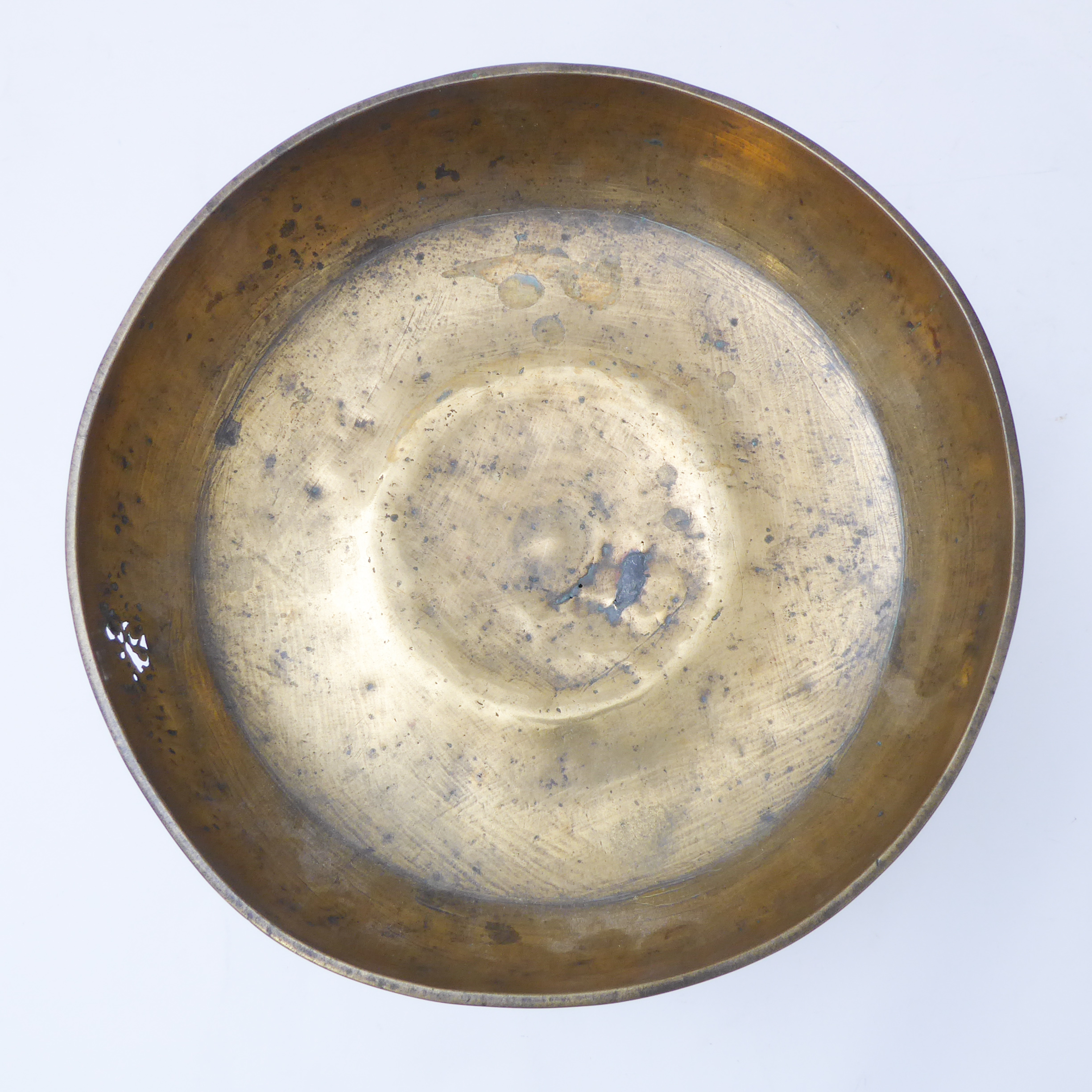 A Chinese brass footed bowl with repoussé banded decoration and pierced foot rim. (A/F) (rim - Image 2 of 3