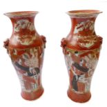 A pair of late 19th / early 20th century Japanese Kutani vases of typical form: gilded and decorated