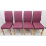A set of four light-maroon upholstered dining/salon chairs